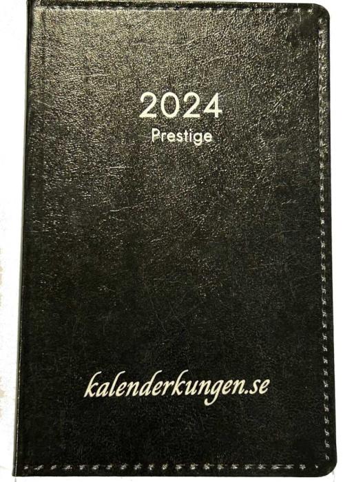 Prestige svart konstläder inbunden 2024